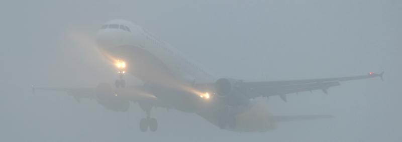 Airplane in the fog
